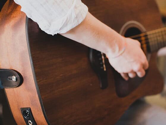 a person playing a guitar